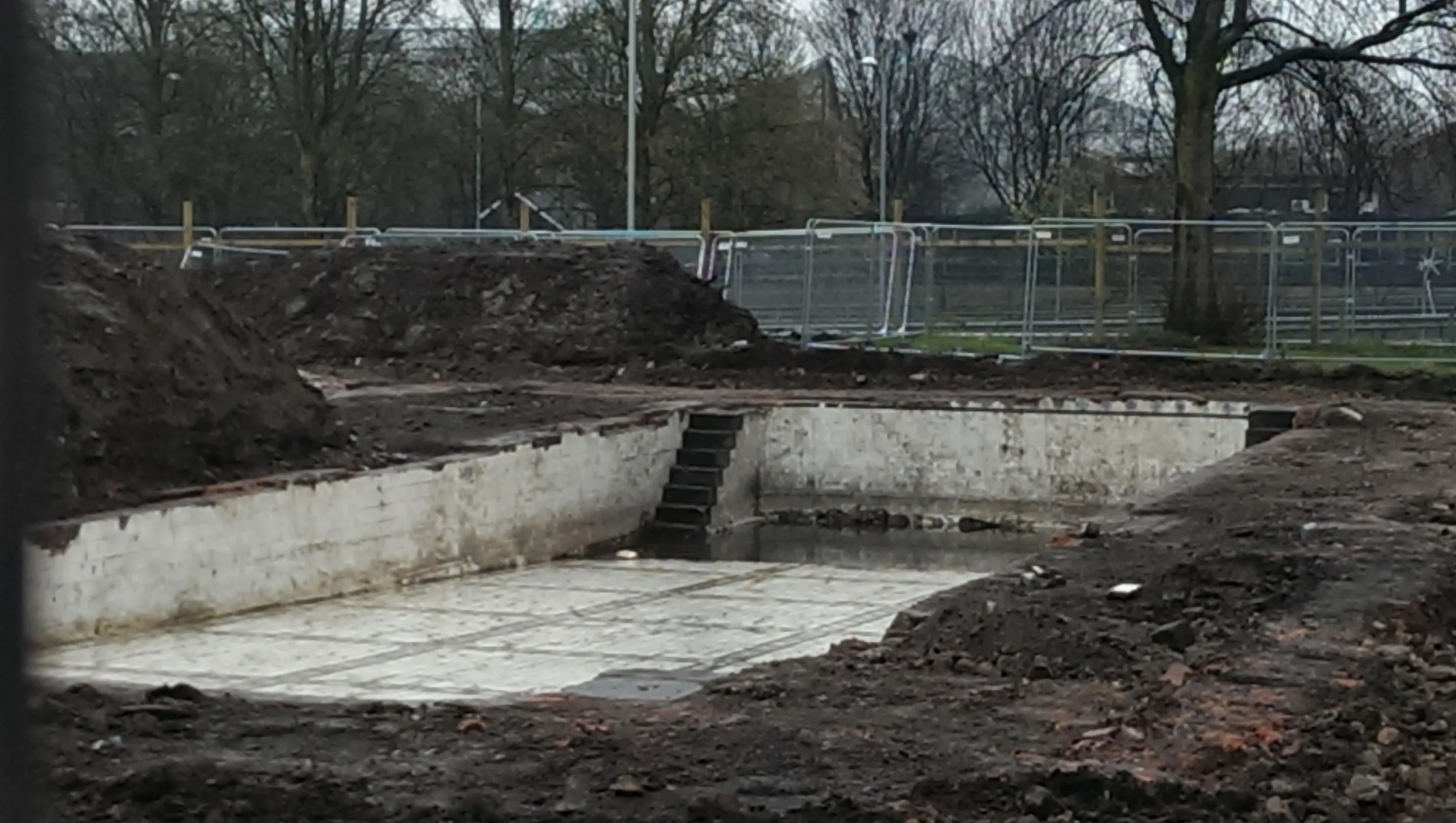 The beautiful second class males swimming pool cracked and full of dirty water